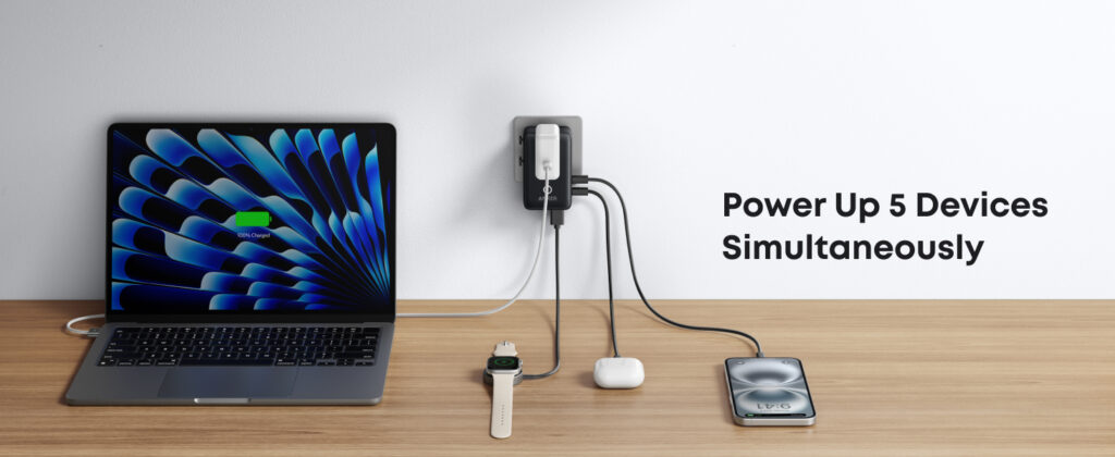 The Best International Travel Adapter is on Sale for $20 2 a picture of the anker adapter charging 5 devices at once