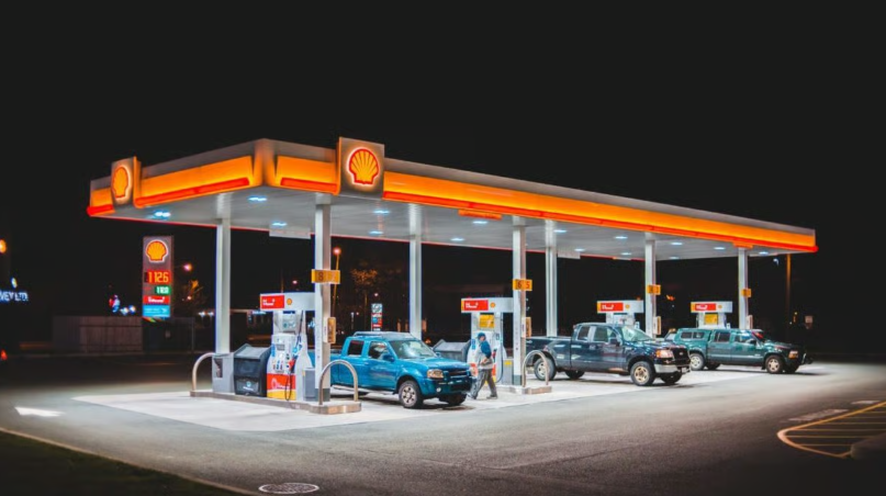 cars at a shell gas station fueling