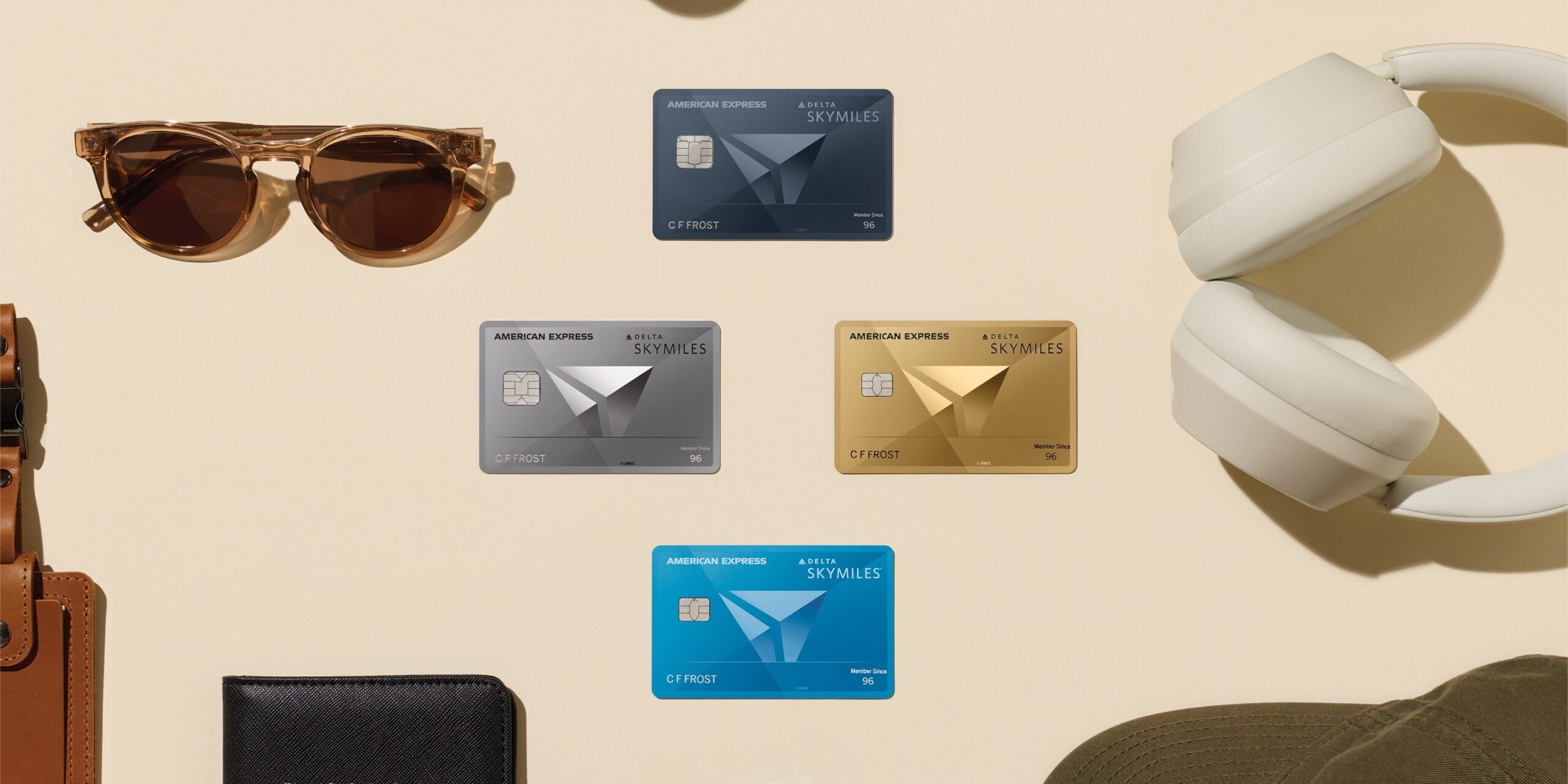 Delta Sweetens SkyMiles Cards: 2nd Bag Free, New Perks & Same Annual Fees 3 New-look Delta SkyMiles Blue, Gold, Platinum, and Reserve Cards with headphones and sunglasses