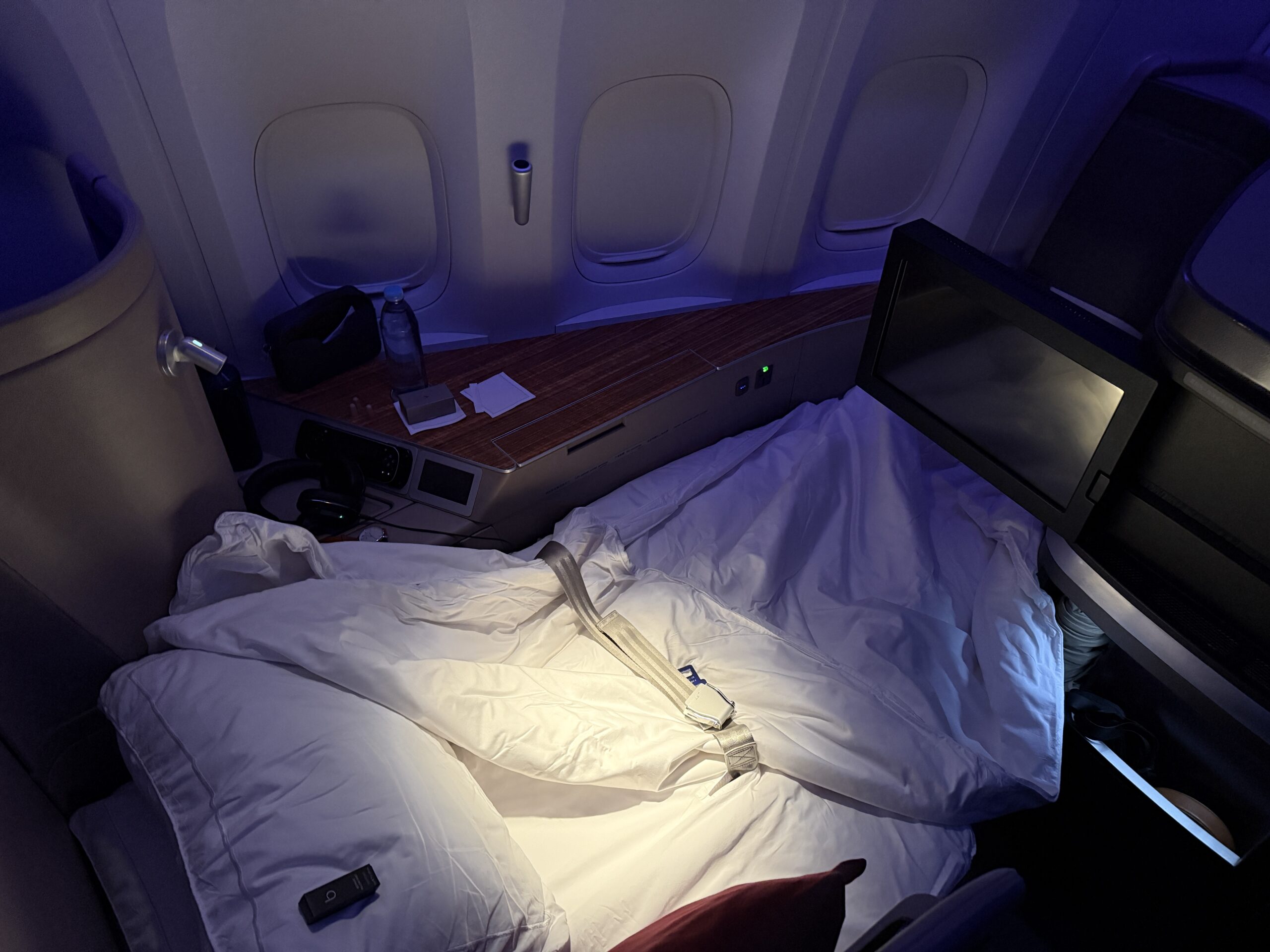 Aging Like a Fine Wine: Cathay Pacific First Class 777 Review 18 first class seat made into a bed