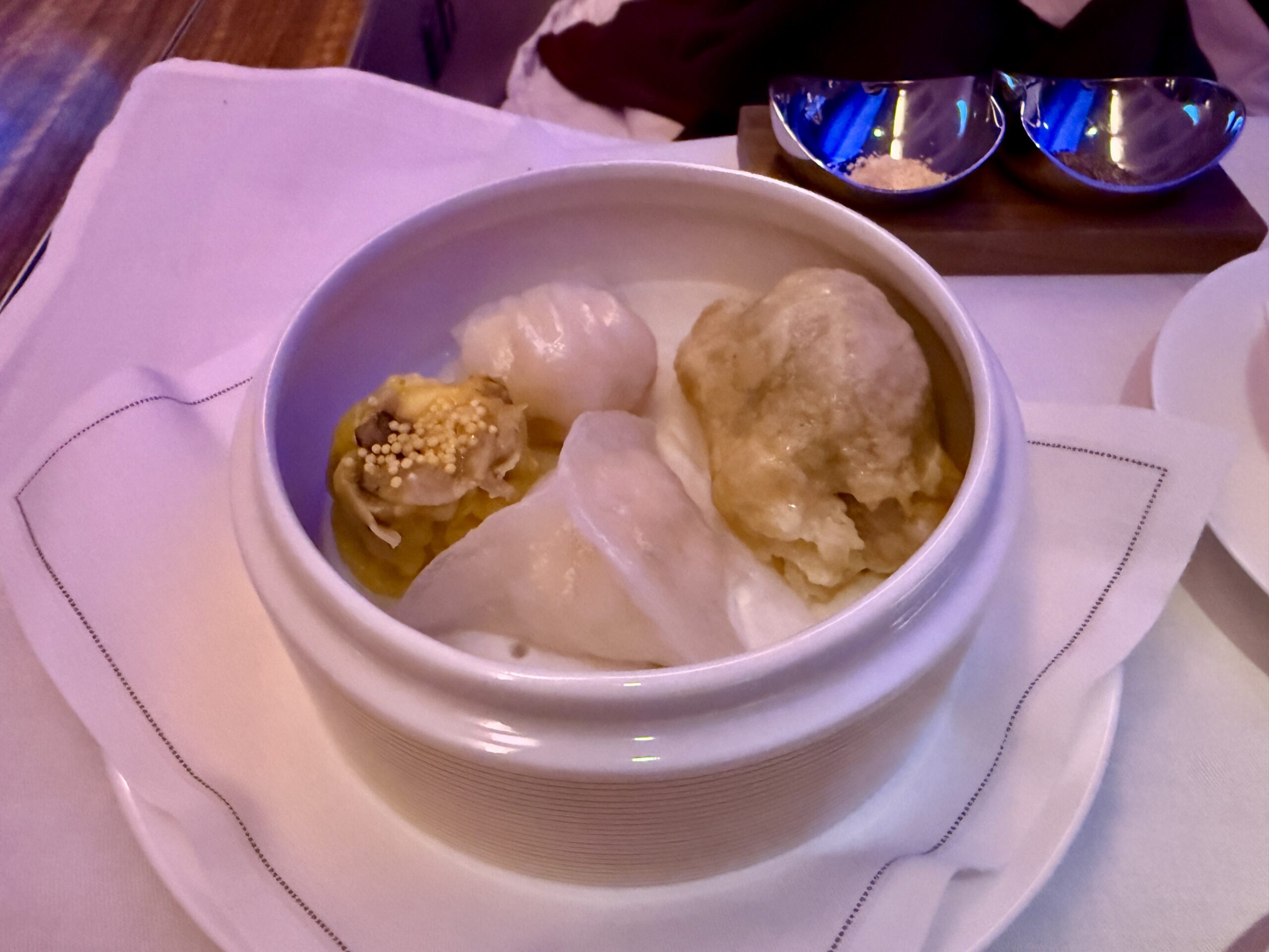 Aging Like a Fine Wine: Cathay Pacific First Class 777 Review 39 dim sum dumplings in ceramic container scaled