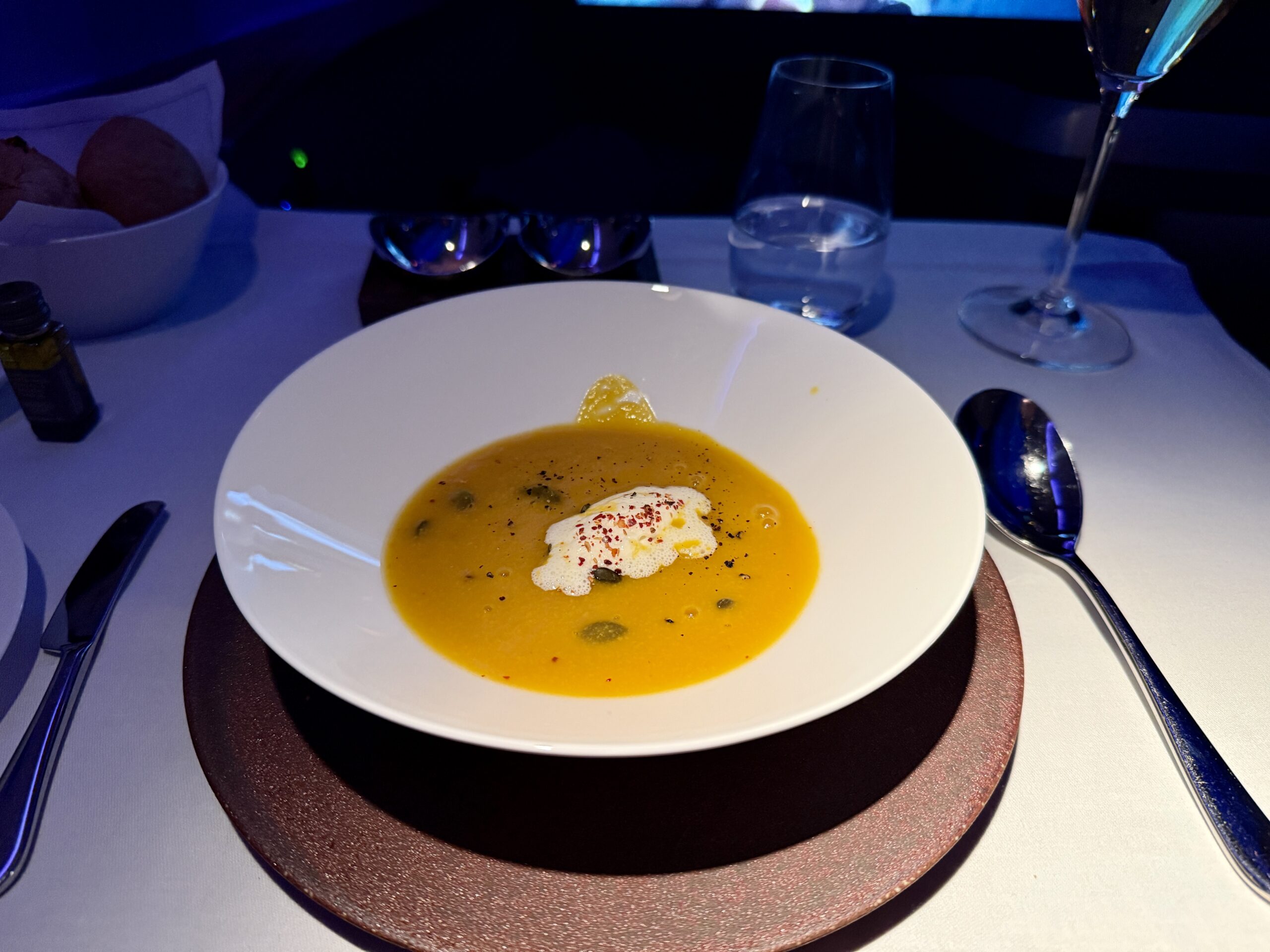 Aging Like a Fine Wine: Cathay Pacific First Class 777 Review 33 bowl of orange pumpkin soup with a dollop of cream