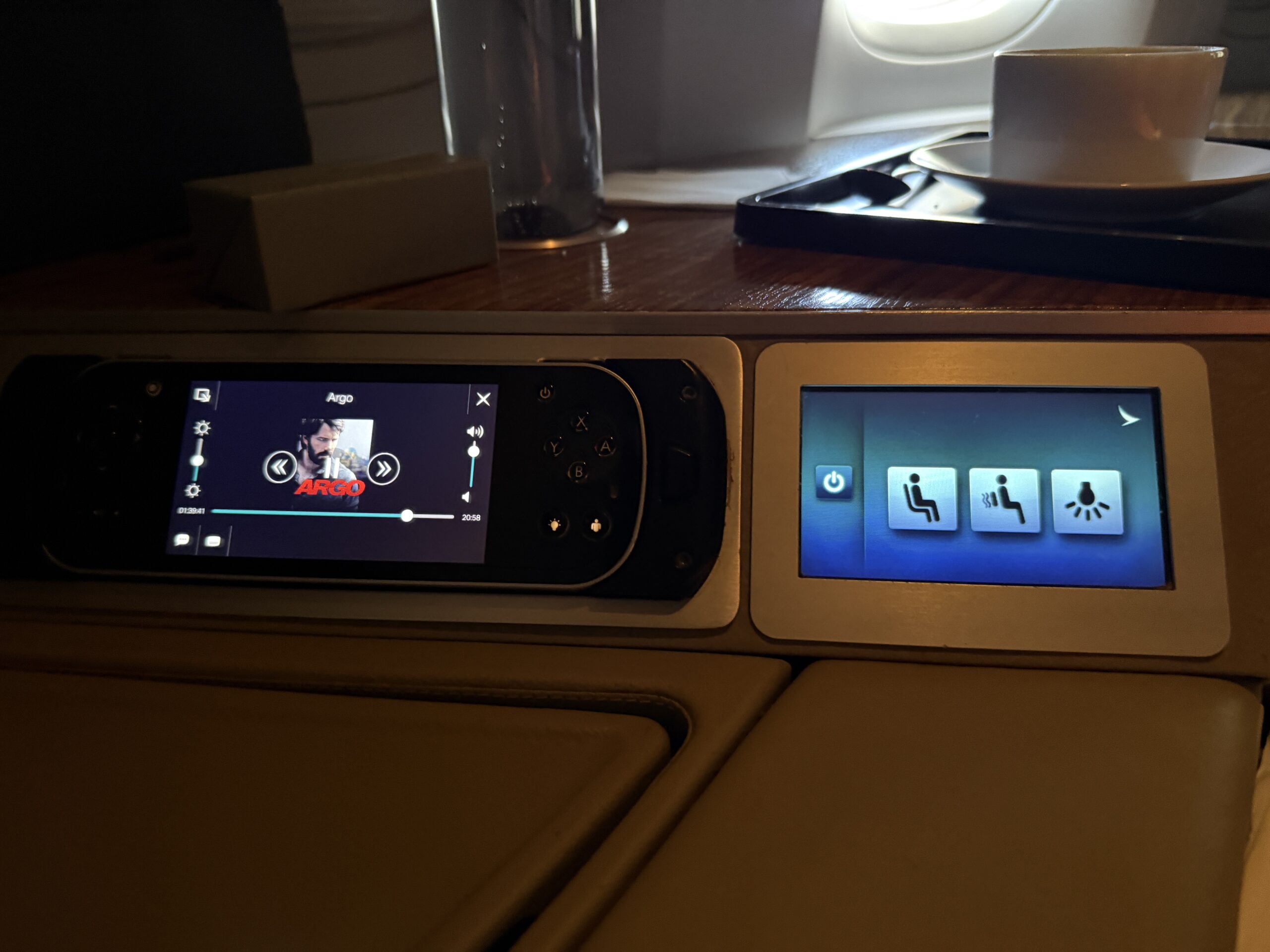Aging Like a Fine Wine: Cathay Pacific First Class 777 Review 22 remote and seat control panel