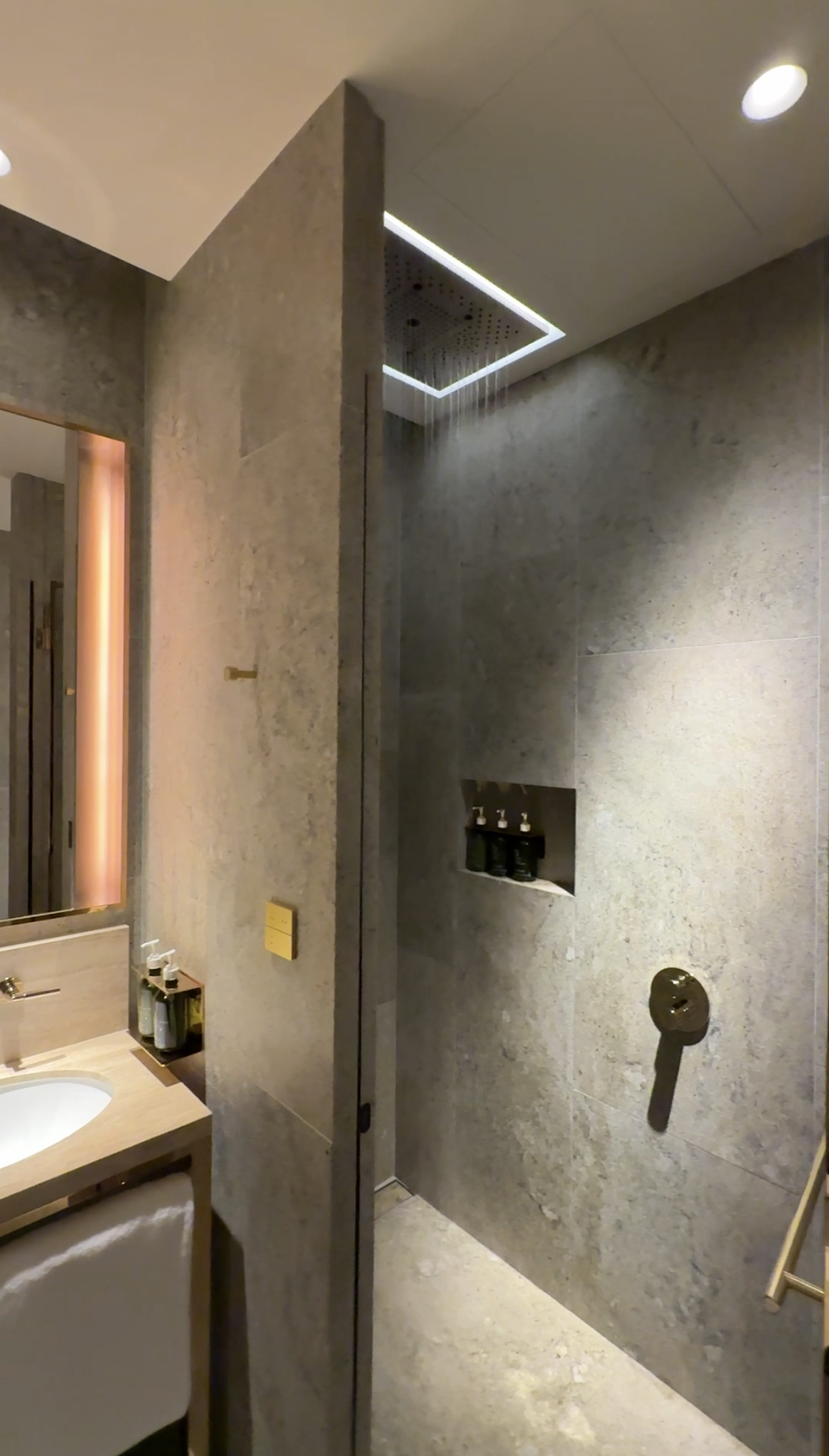 Aging Like a Fine Wine: Cathay Pacific First Class 777 Review 8 stone shower suite