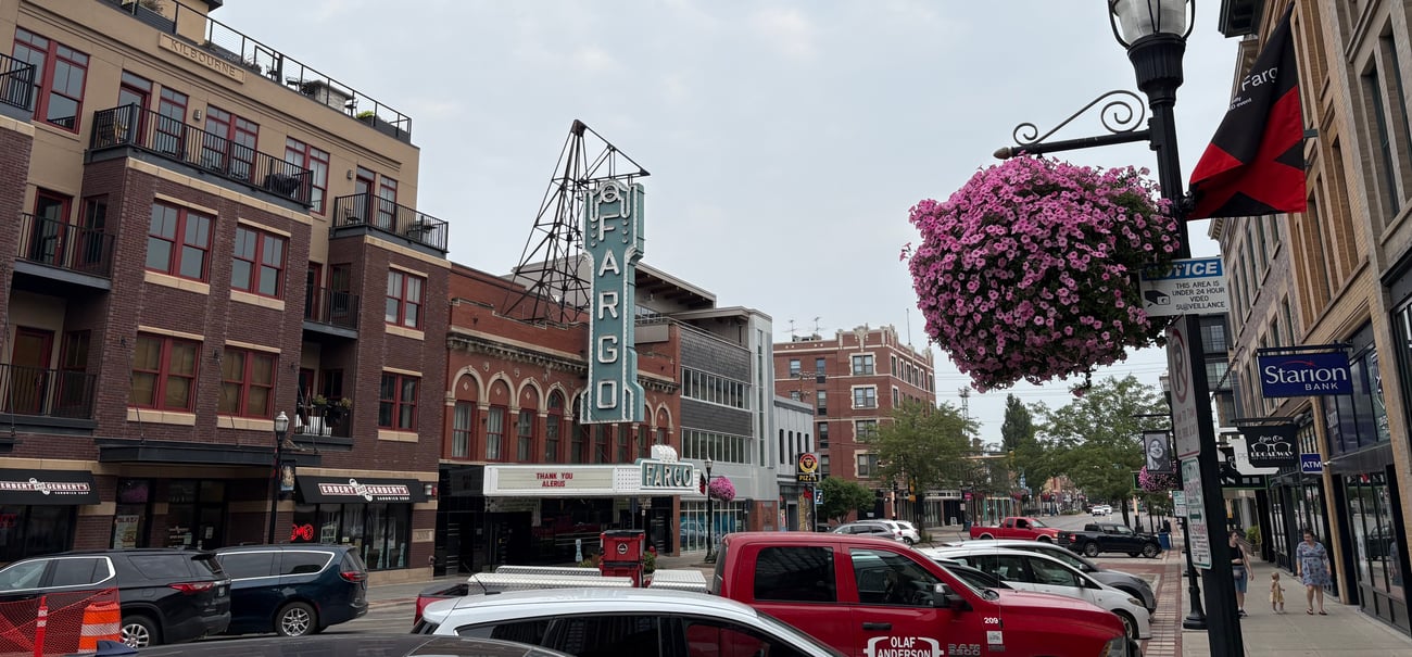 The Extra Mile, July 31: Testing Amex's New Transfer Partner, AA's Ugly Move & More 7 city street with fargo marquee sign for a theater
