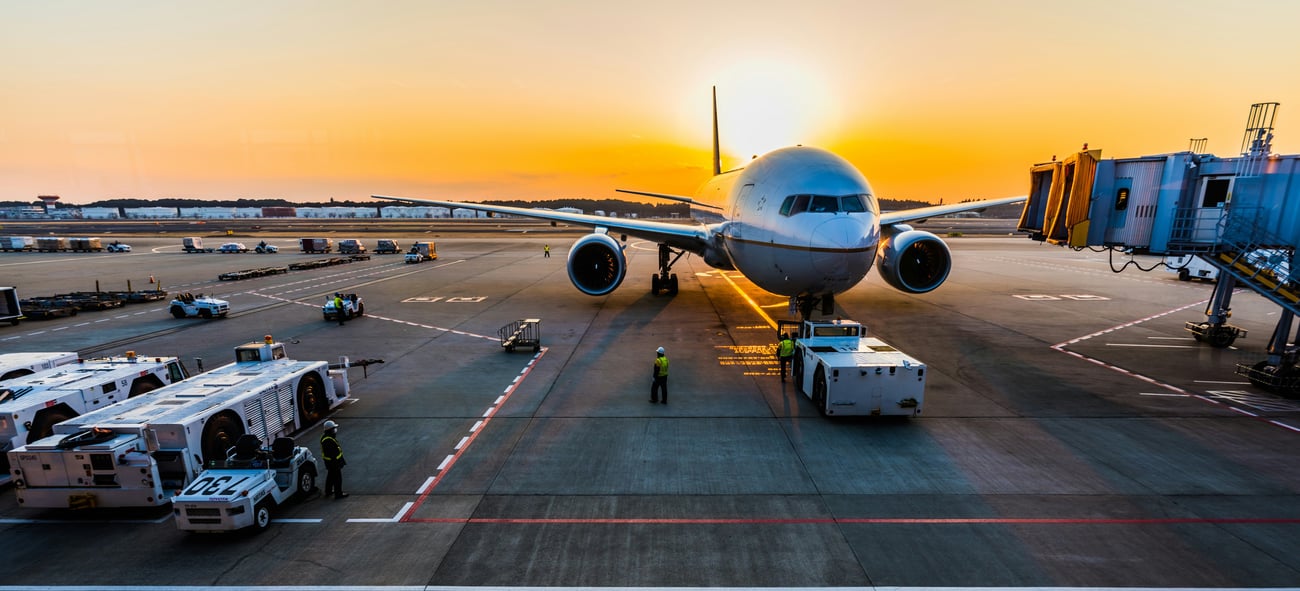 The Extra Mile, July 24: A Trick for Cheap Flights to Hawaii, Hong Kong from 29K SkyMiles Roundtrip & More 10 An airplane pushing back from the gate with sunset in background