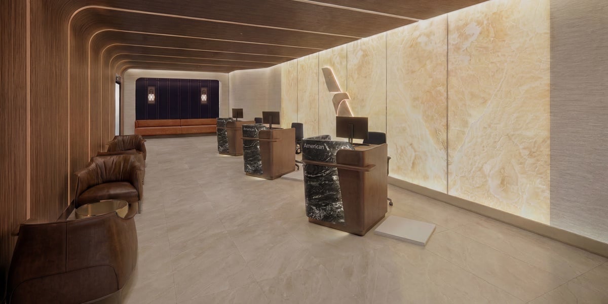 The Extra Mile, July 21: Delta’s Growing Grip on MSP, A First Class Deal to Hawaii & More 7 rendering of american airlines lounge entry with several check-in kiosks