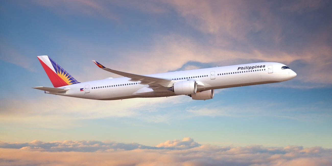 Philippine Airlines plane flying through the sky