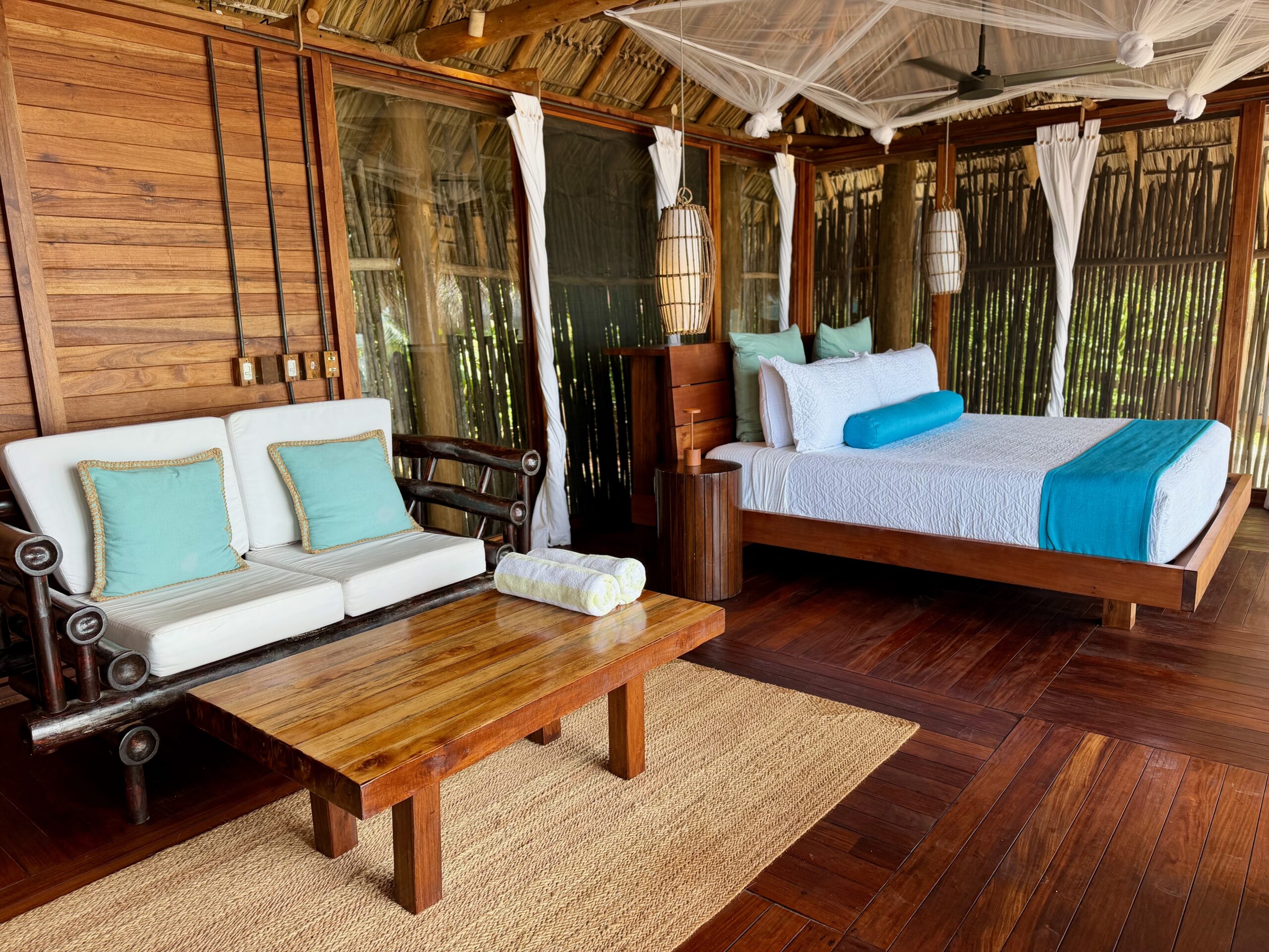 Calala Island Review: Is Hilton's Private-Island Splurge Worth 240K Points a Night? 15 Cabana at Calala island with loveseat and bed