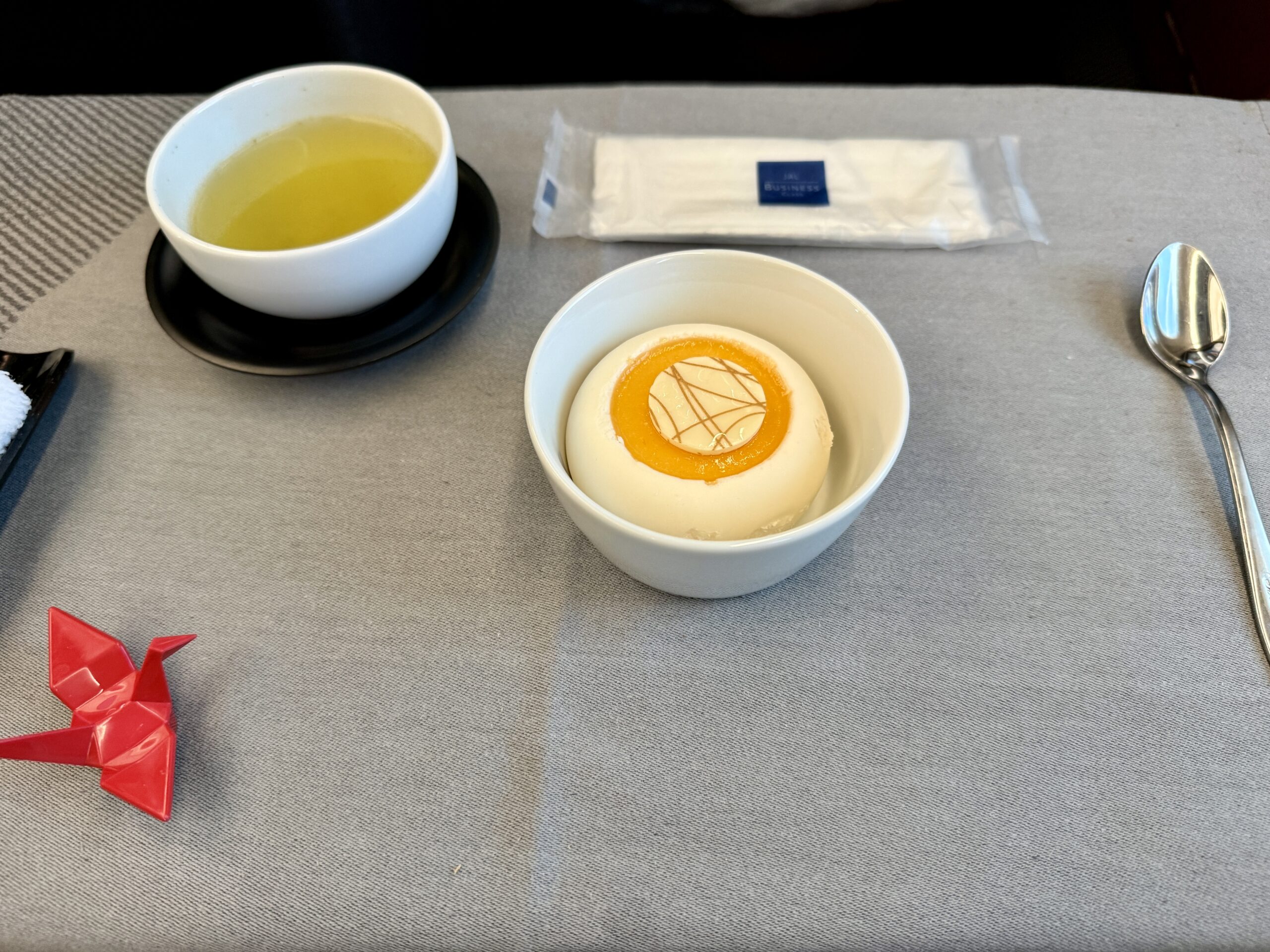 A 5-Star Flight to Tokyo: JAL's New A350 Business Class Suites 74 circular cake with tea on a tray table