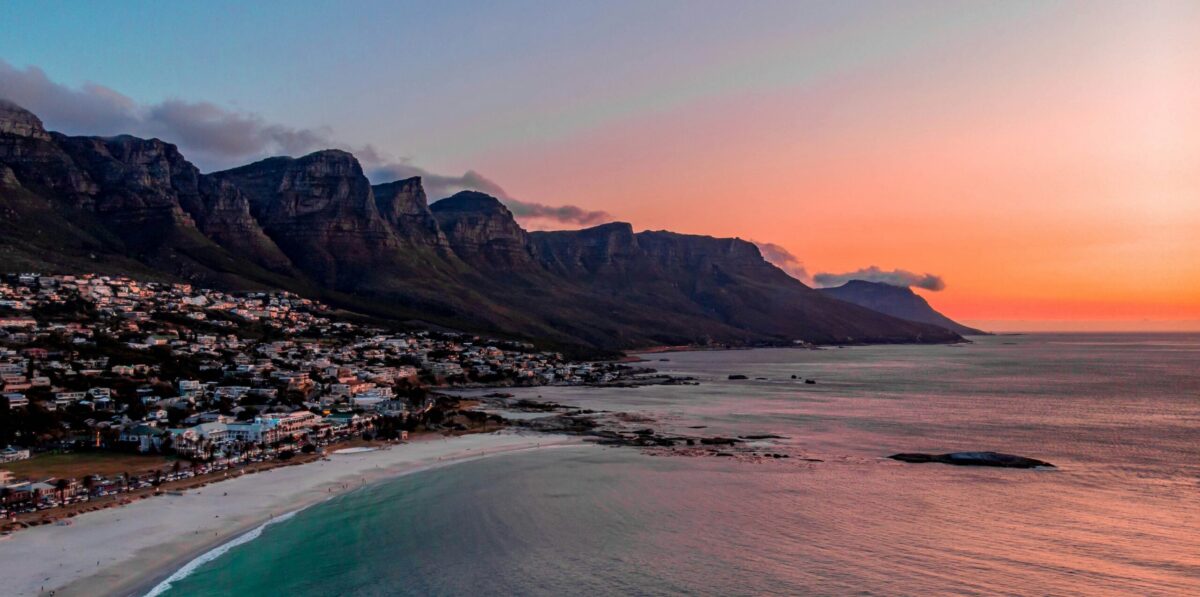 cape town skyline with table mountains and sunset in background