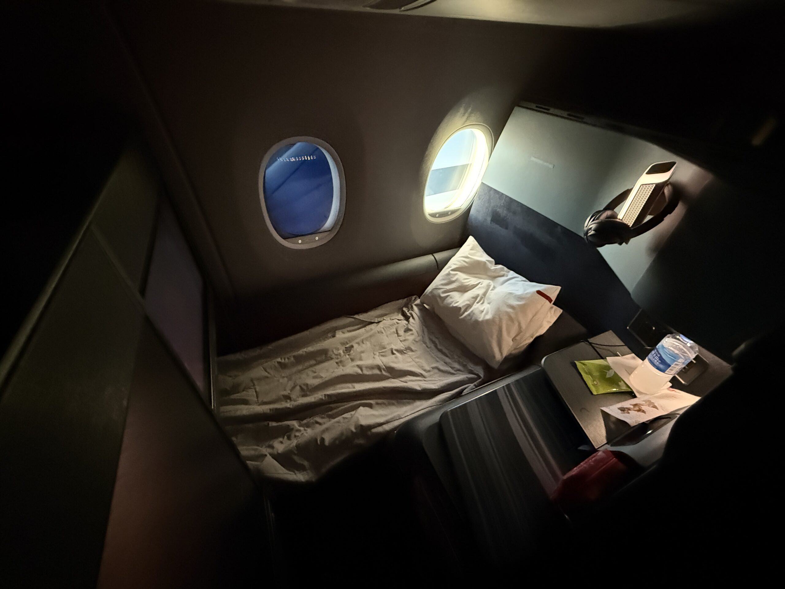 A 5-Star Flight to Tokyo: JAL's New A350 Business Class Suites 65 jal a350 business class bed with window open