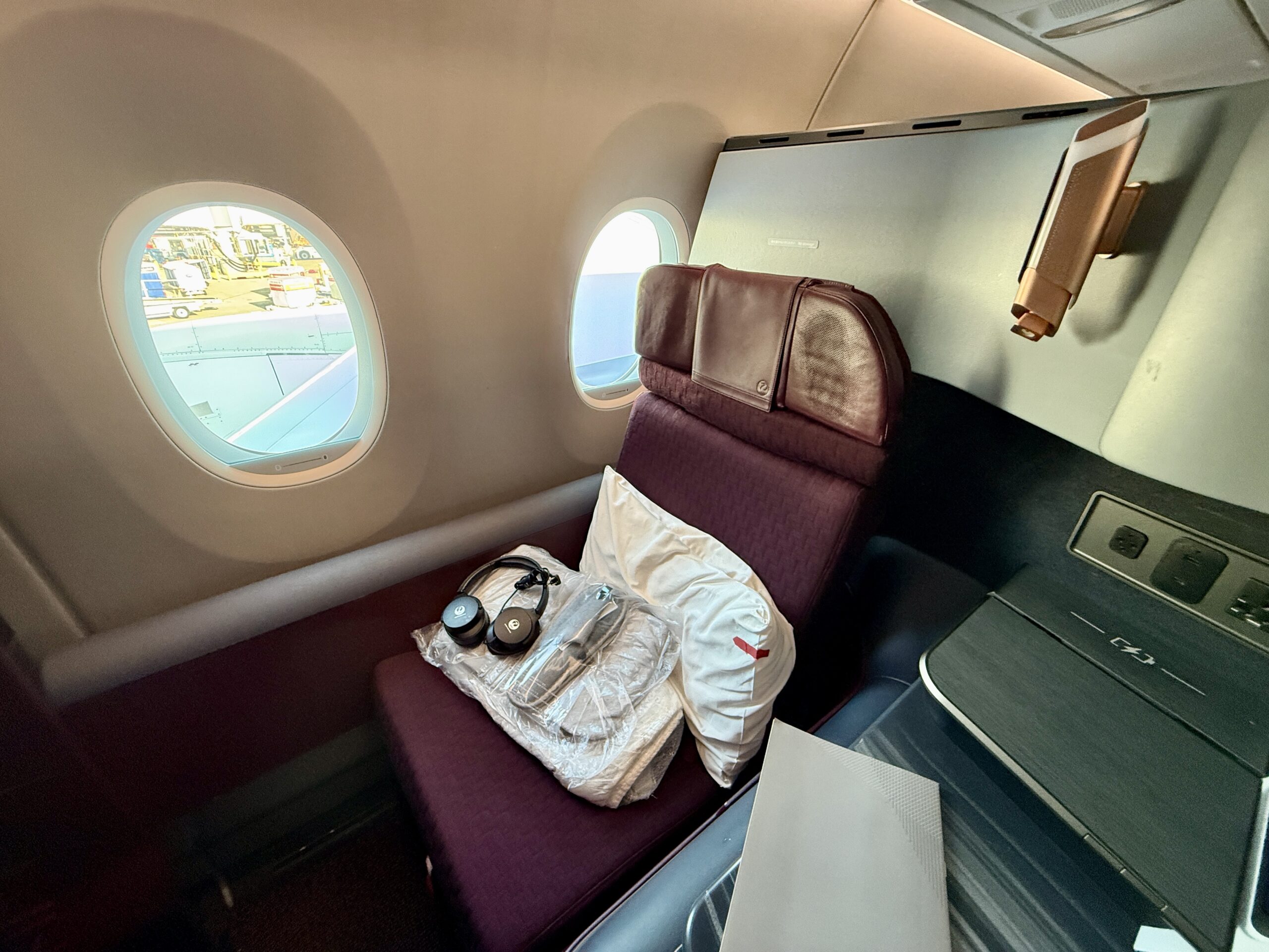 A 5-Star Flight to Tokyo: JAL's New A350 Business Class Suites 67 pillow and bedding sitting on business class seat