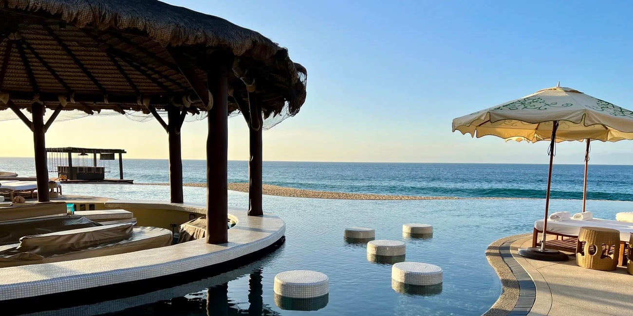 The Extra Mile, Oct. 1: More Hyatt Pain, Earn 7x on Dining & More! 6 pool with bar seating in front of beach